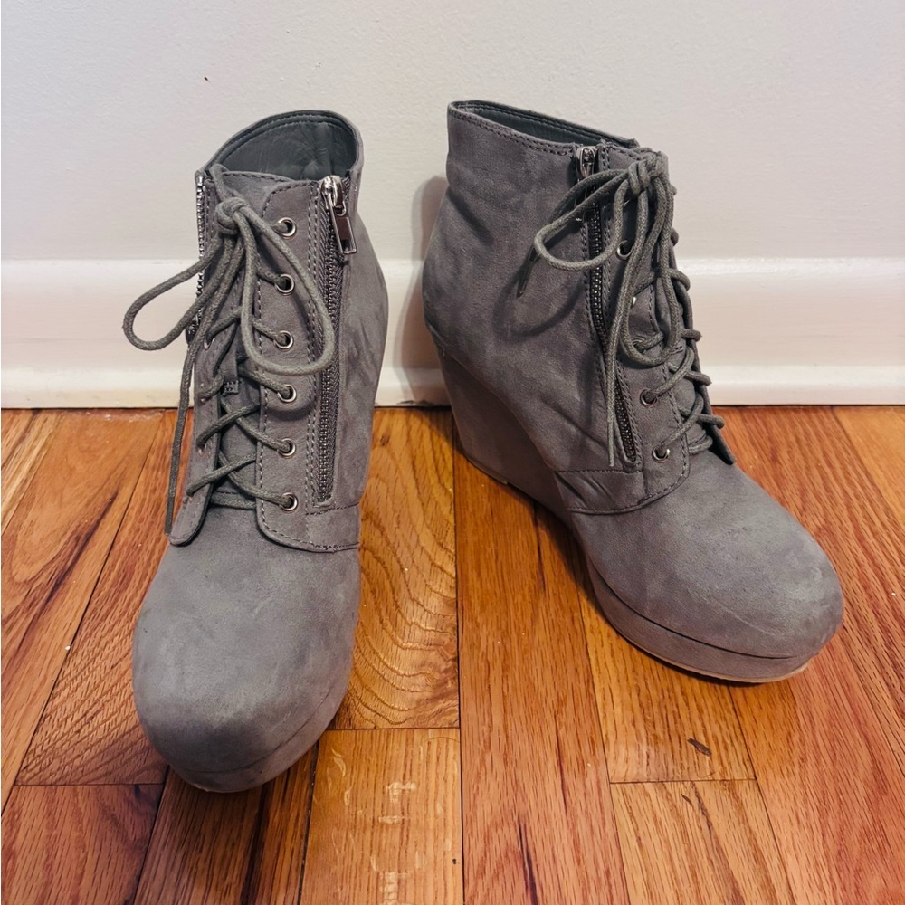 Justfab grey wedge bootie heels, lace up front and size zippers.